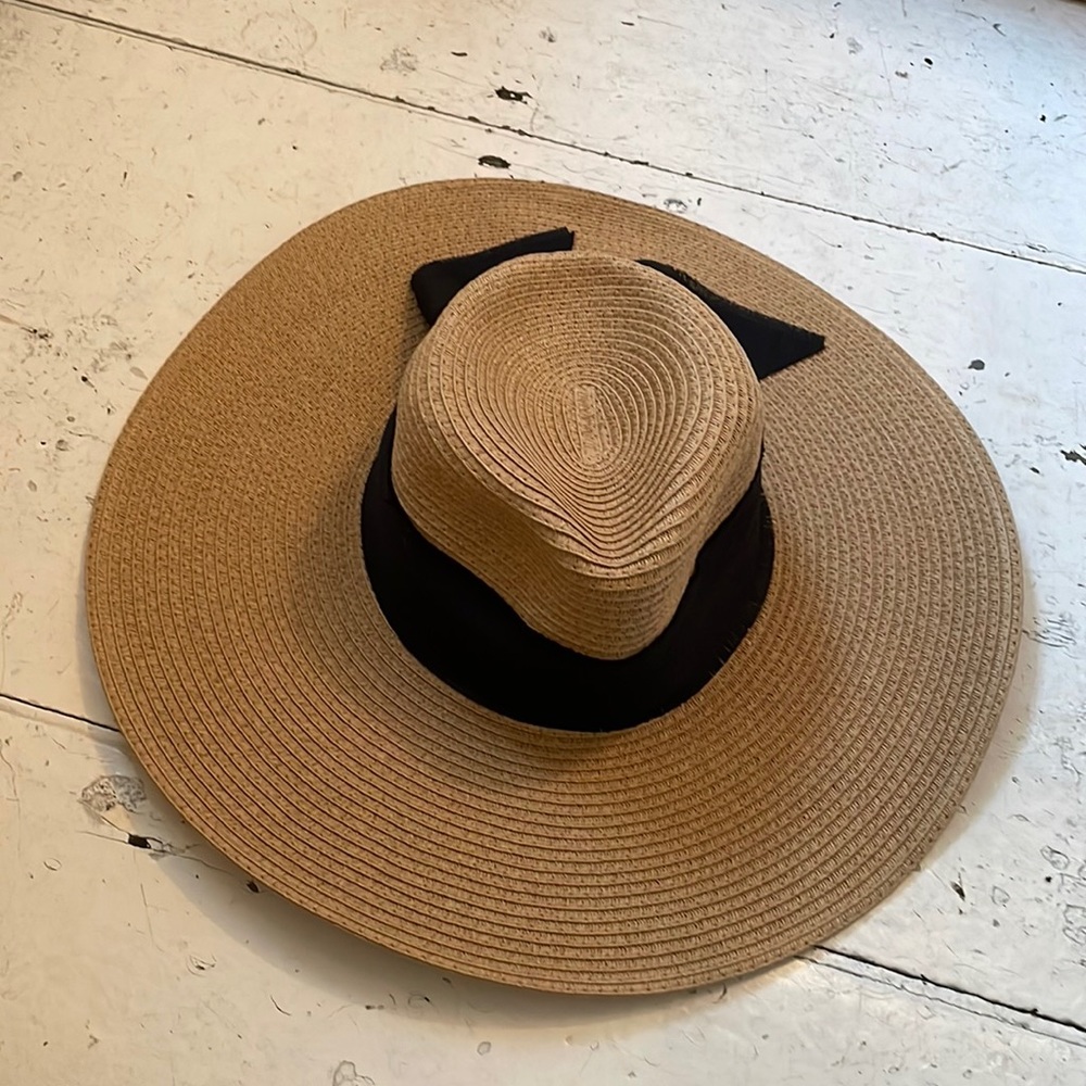 Saks Fifth Avenue sun hat with black ribbon.